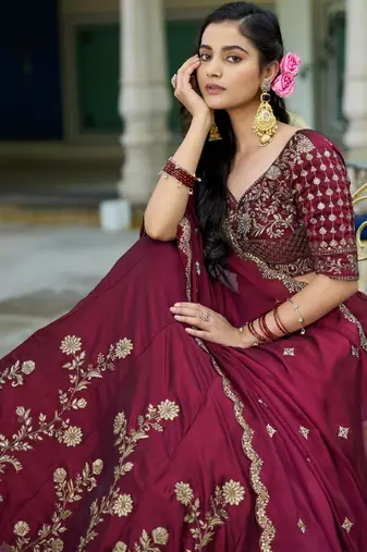 Magenta Vichitra silk lehenga choli set featuring intricate sequins and thread embroidery