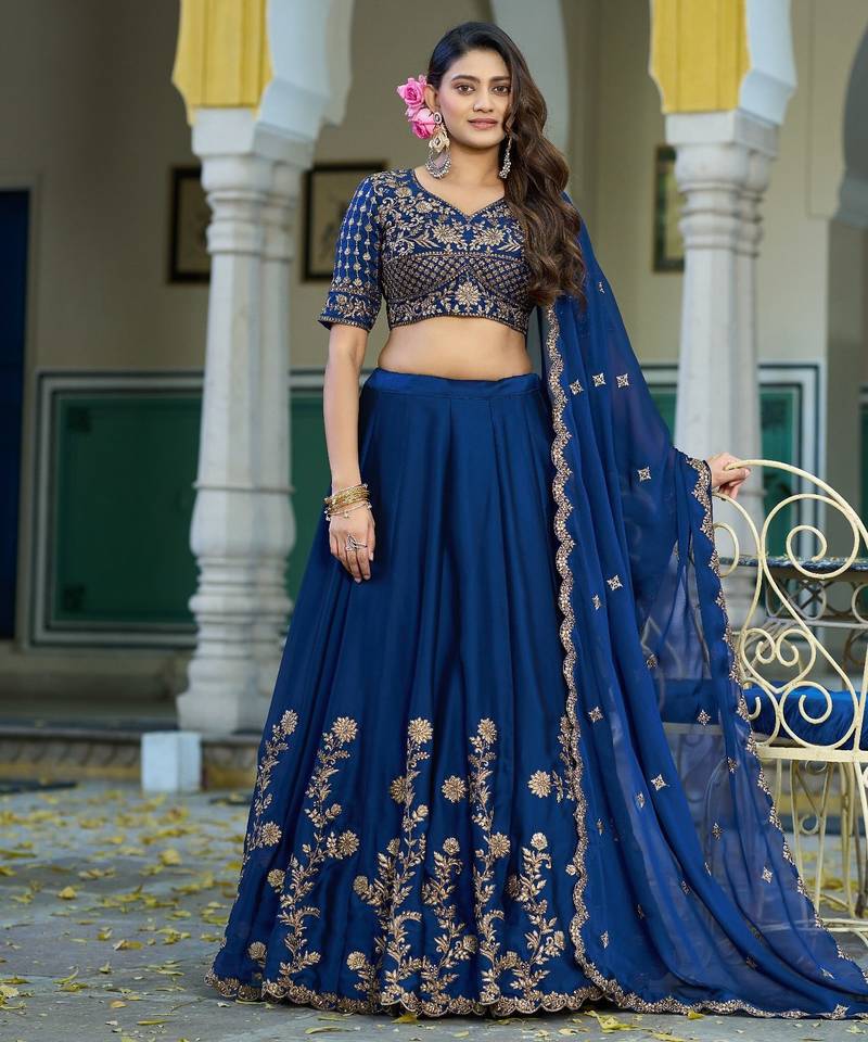 Blue Vichitra silk lehenga choli set featuring intricate sequins and thread embroidery