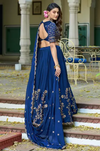Blue Vichitra silk lehenga choli set featuring intricate sequins and thread embroidery