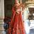 Rust orange Vichitra silk lehenga choli set featuring intricate sequins and thread embroidery