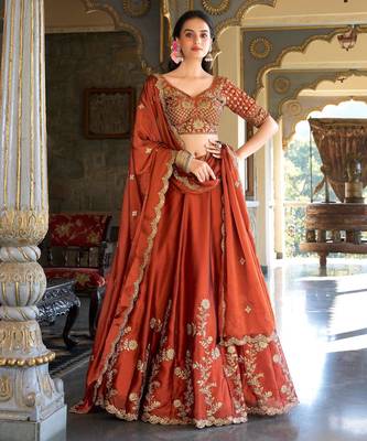 Rust orange Vichitra silk lehenga choli set featuring intricate sequins and thread embroidery 3