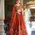 Rust orange Vichitra silk lehenga choli set featuring intricate sequins and thread embroidery