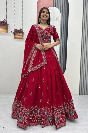 Red Vichitra silk lehenga choli set featuring intricate sequins and thread embroidery