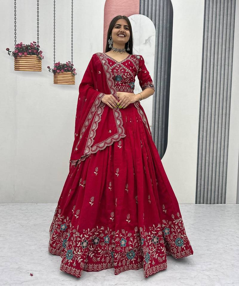 Red Vichitra silk lehenga choli set featuring intricate sequins and thread embroidery