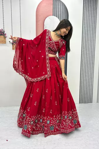 Red Vichitra silk lehenga choli set featuring intricate sequins and thread embroidery