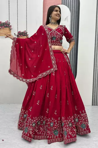Red Vichitra silk lehenga choli set featuring intricate sequins and thread embroidery
