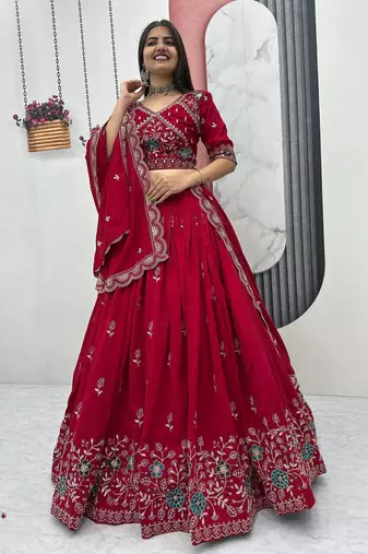 Red Vichitra silk lehenga choli set featuring intricate sequins and thread embroidery
