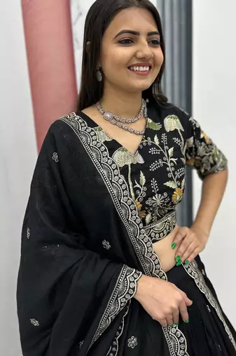 Black Vichitra silk lehenga choli set featuring intricate sequins and thread embroidery
