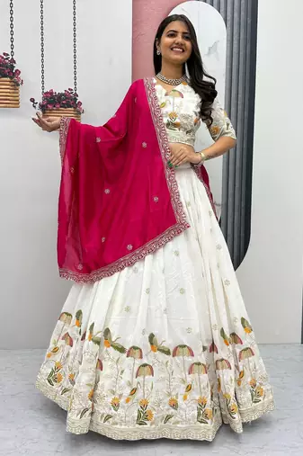 White Vichitra silk lehenga choli set featuring intricate sequins and thread embroidery