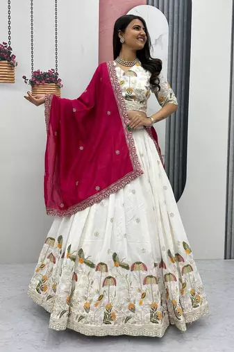 White Vichitra silk lehenga choli set featuring intricate sequins and thread embroidery