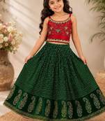 Red & green placement embroidered polyester top with lehenga ethnic wear