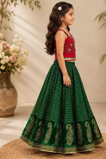 Red & green placement embroidered polyester top with lehenga ethnic wear