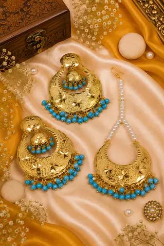 Gold tone earrings & tikka