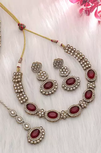Maroon color kundan necklace set