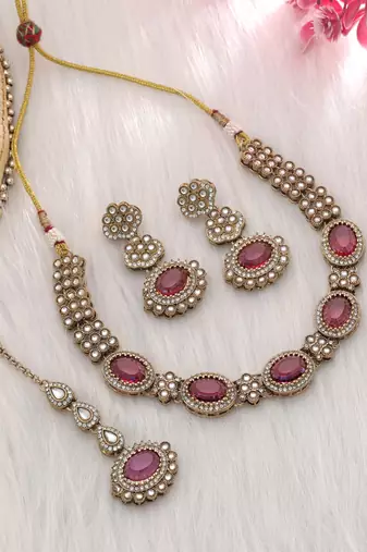 Magenta color kundan necklace set