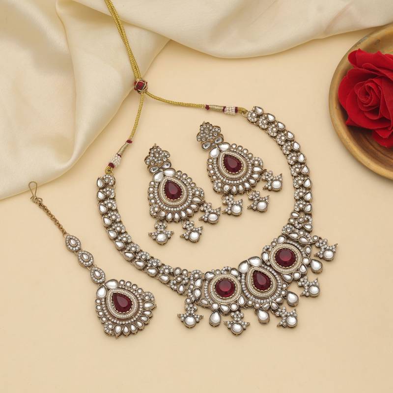 Maroon color kundan necklace set