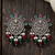 Oxidized silver-tone lotus motif jhumki necklace set with sapphire-blue accents