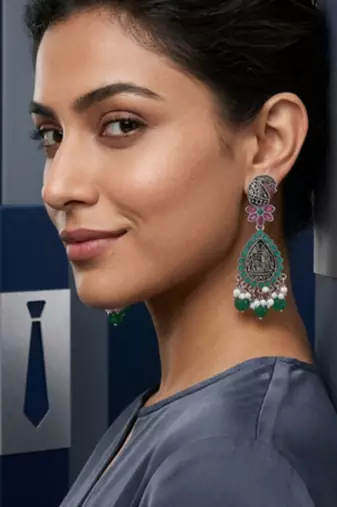 Oxidized silver-tone lotus motif jhumki necklace set with emerald-green accents