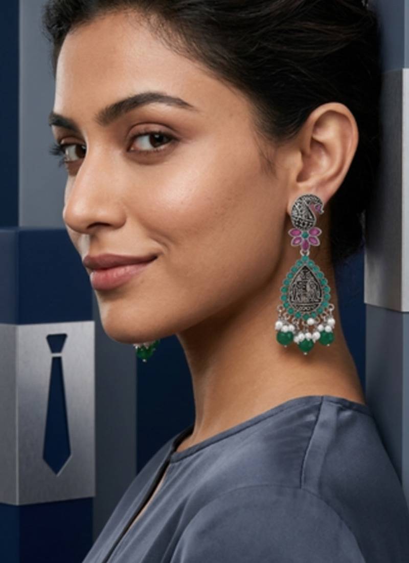 Oxidized silver-tone lotus motif jhumki necklace set with emerald-green accents