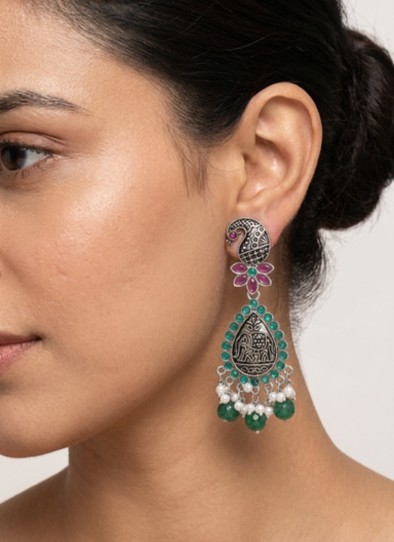 Oxidized silver-tone lotus motif jhumki necklace set with emerald-green accents