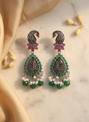 Oxidized silver-tone lotus motif jhumki necklace set with emerald-green accents 1