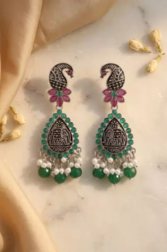 Oxidized silver-tone lotus motif jhumki necklace set with emerald-green accents
