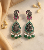Oxidized silver-tone lotus motif jhumki necklace set with emerald-green accents