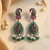 Oxidized silver-tone lotus motif jhumki necklace set with emerald-green accents