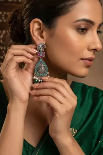 Oxidized silver-tone lotus motif jhumki necklace set with emerald-green accents