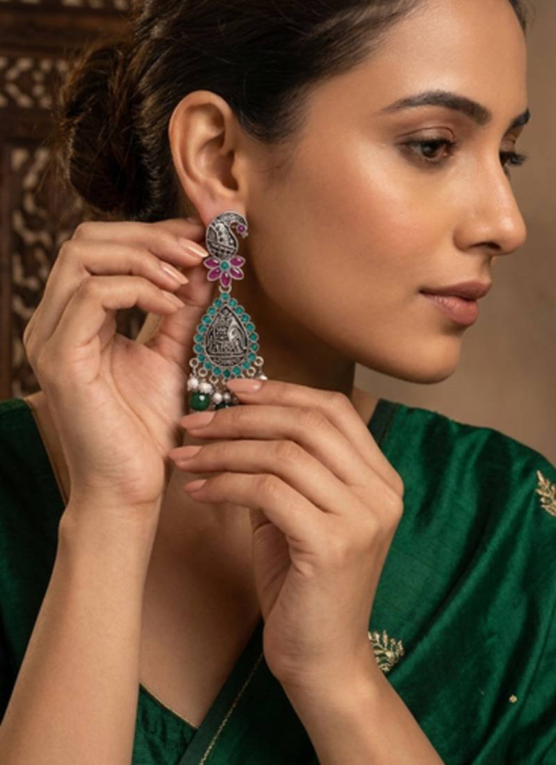 Oxidized silver-tone lotus motif jhumki necklace set with emerald-green accents