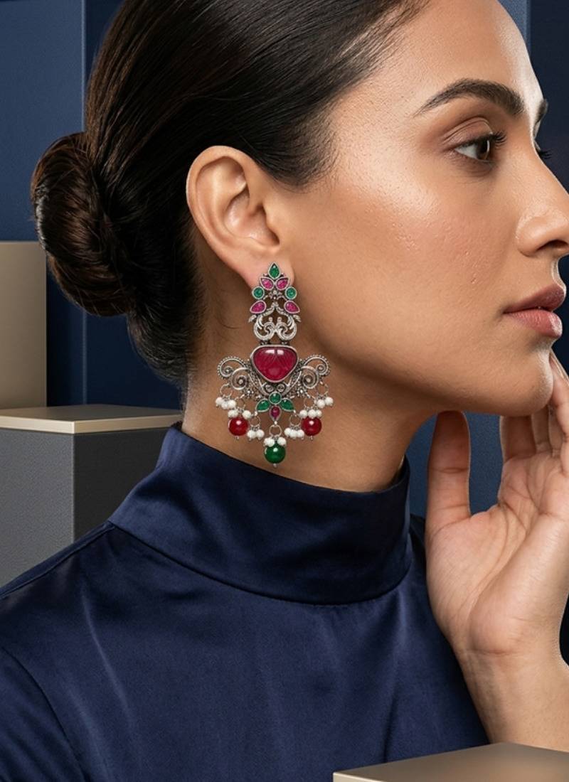 Oxidized silver-tone lotus motif jhumki necklace set with blue accents