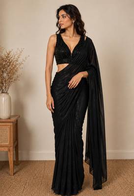 Black beads work shiny georgette partywear saree with full of beads work blouse fabric. 2