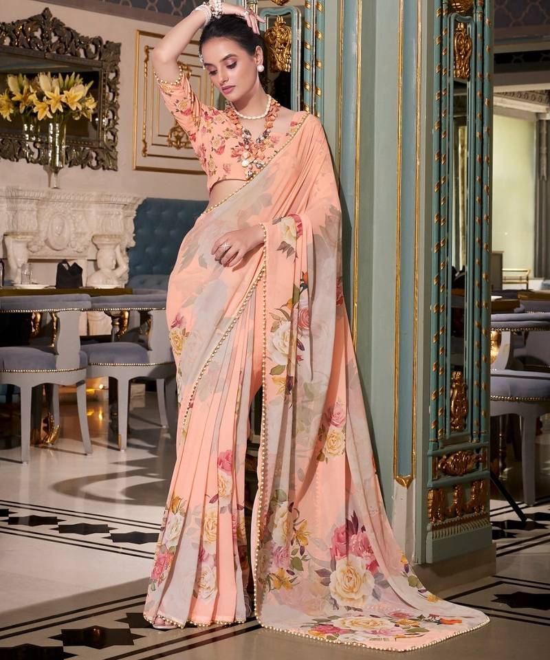 Peach georgette smart floral printed saree with pearl lace border