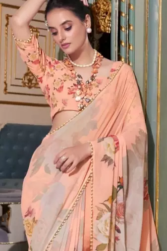 Peach georgette smart floral printed saree with pearl lace border