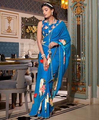 Firozi georgette smart floral printed saree with pearl lace border 1