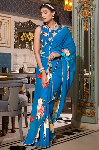 Firozi georgette smart floral printed saree with pearl lace border