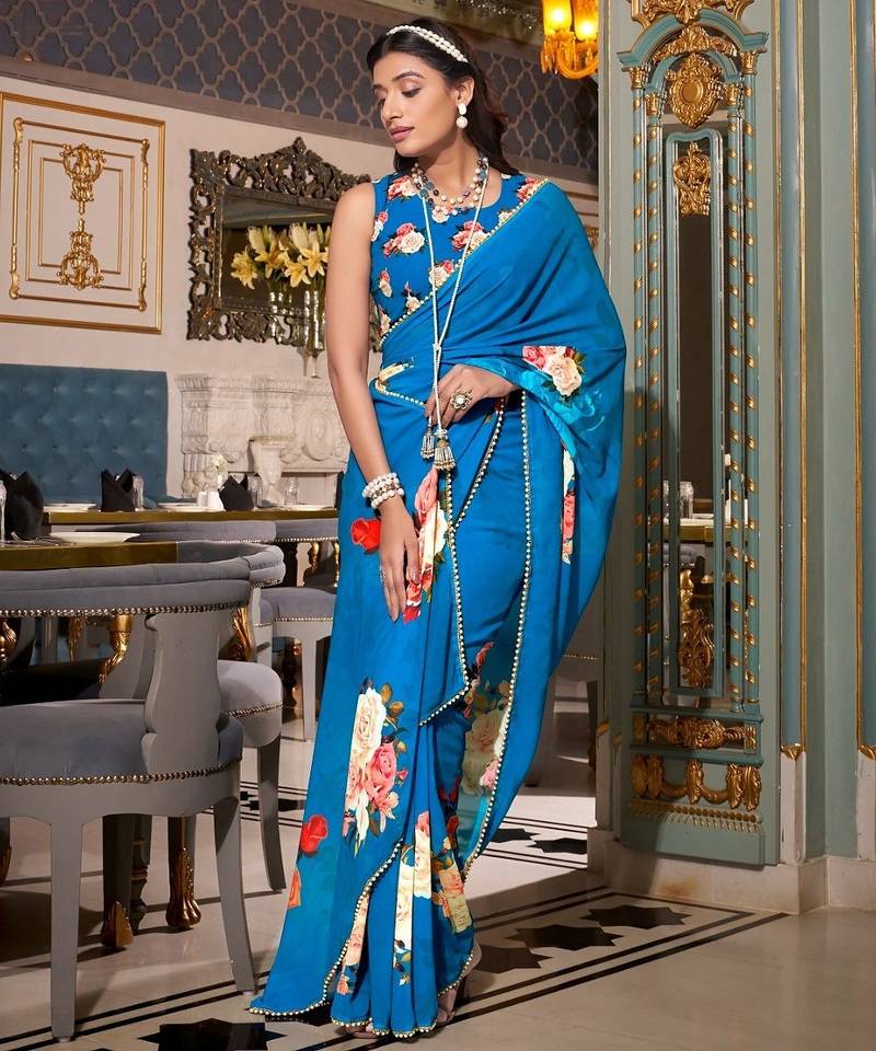 Firozi georgette smart floral printed saree with pearl lace border