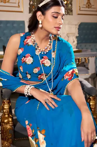 Firozi georgette smart floral printed saree with pearl lace border