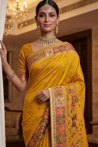 Yellow virana silk blend heavy woven saree with elegant swarovski work