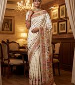Off white virana silk blend heavy woven saree with elegant swarovski work