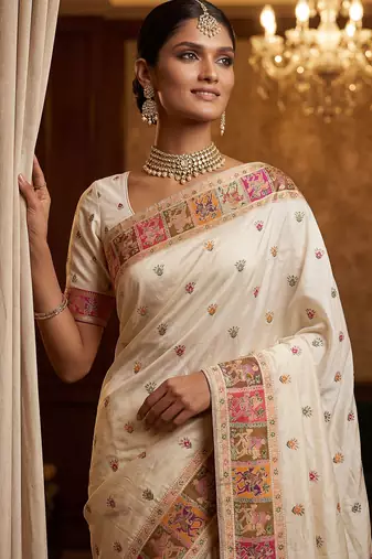 Off white virana silk blend heavy woven saree with elegant swarovski work