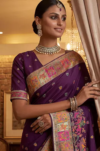 Wine virana silk blend heavy woven saree with elegant swarovski work