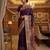 Wine virana silk blend heavy woven saree with elegant swarovski work