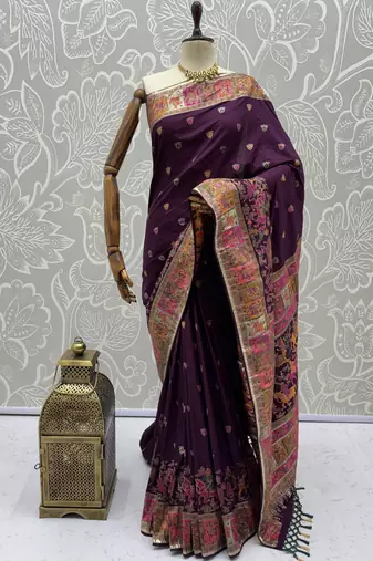 Wine virana silk blend heavy woven saree with elegant swarovski work