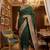 Green virana silk blend heavy woven saree with elegant swarovski work