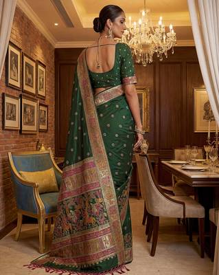 Green virana silk blend heavy woven saree with elegant swarovski work 2