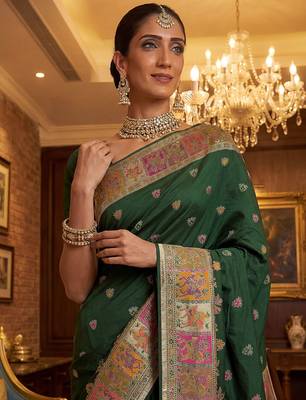 Green virana silk blend heavy woven saree with elegant swarovski work 3