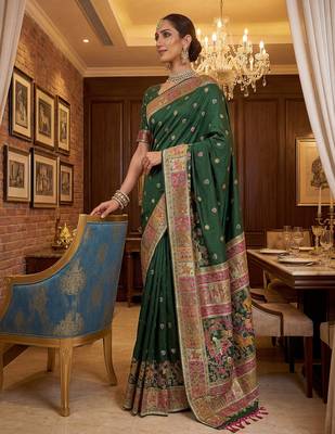 Green virana silk blend heavy woven saree with elegant swarovski work 4