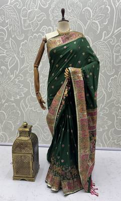Green virana silk blend heavy woven saree with elegant swarovski work 5