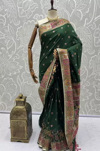 Green virana silk blend heavy woven saree with elegant swarovski work